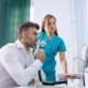 Adult man completing a spirometry test to evaluate lung function for asthma diagnosis